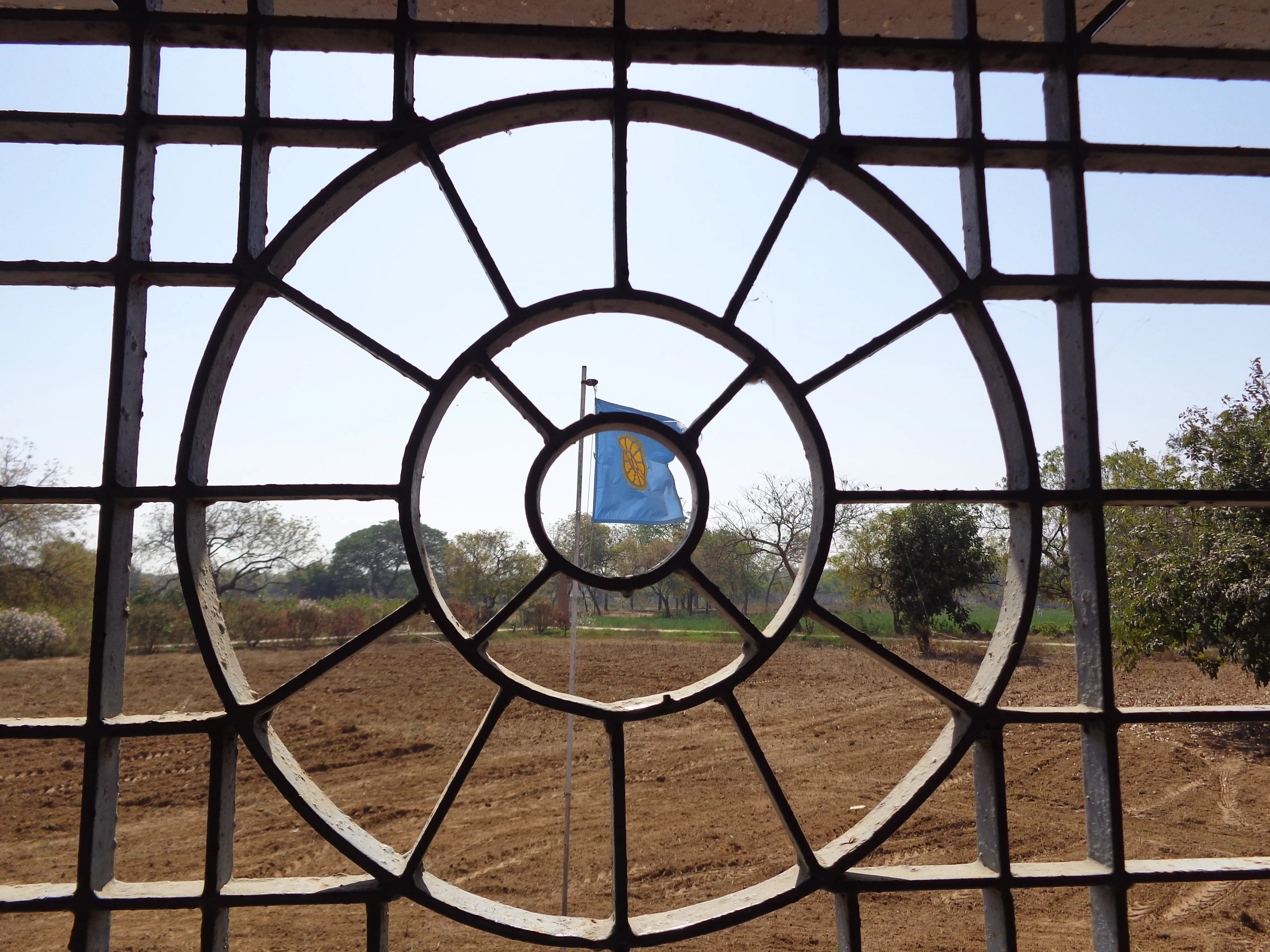 Ompuri flag viewed through Mahamandir architecture