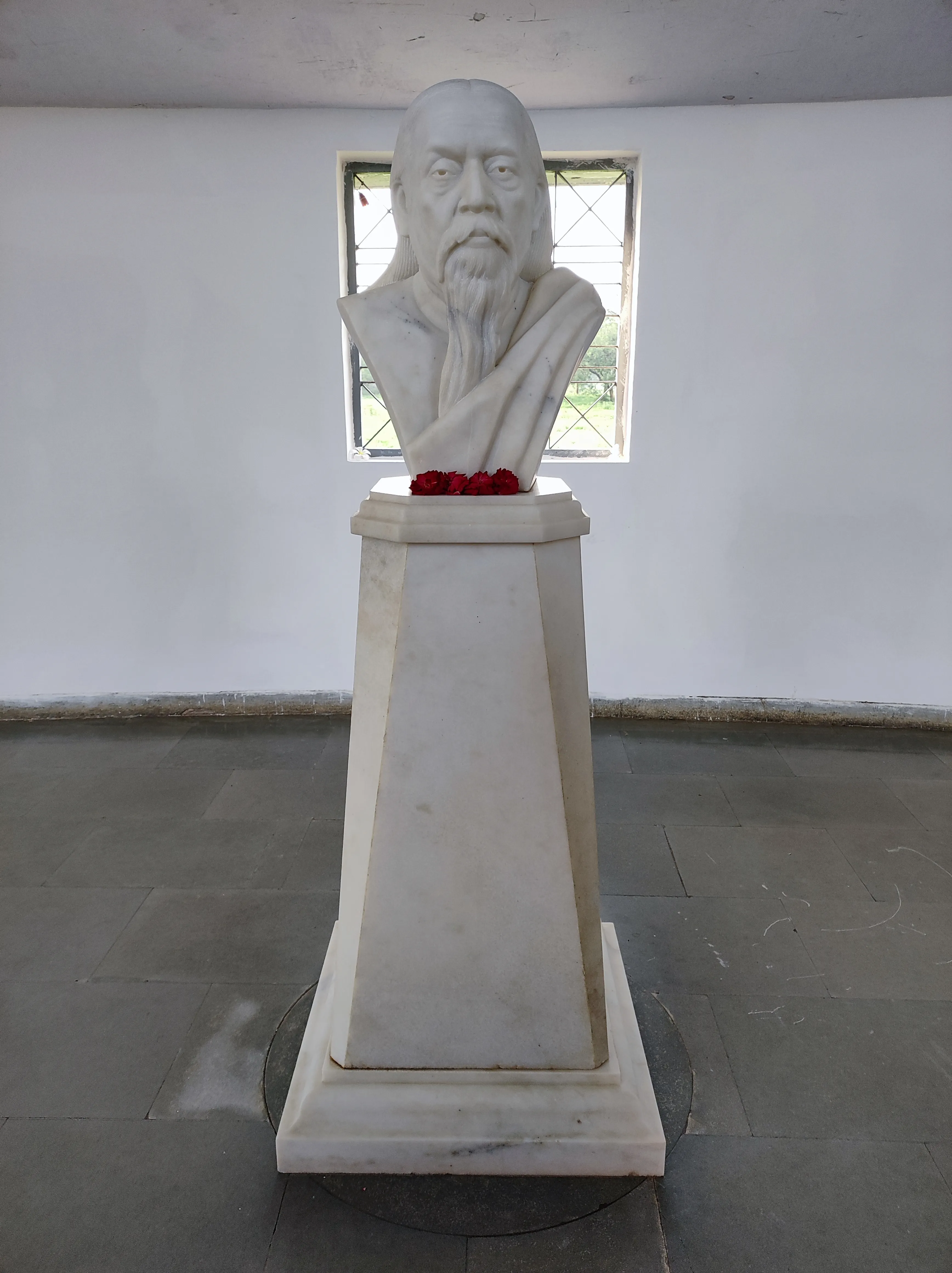 Sri Aurobindo portrait at Mahamandir - Visionary founder of Integral Yoga and inspiration behind Ompuri spiritual township in Gujarat